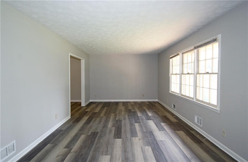 5 bedroom, 4 bathroom, 2,218 sq ft single family residence for sale at 4828 Scotland Drive, Stone Mountain, GA 30088 — photo 4