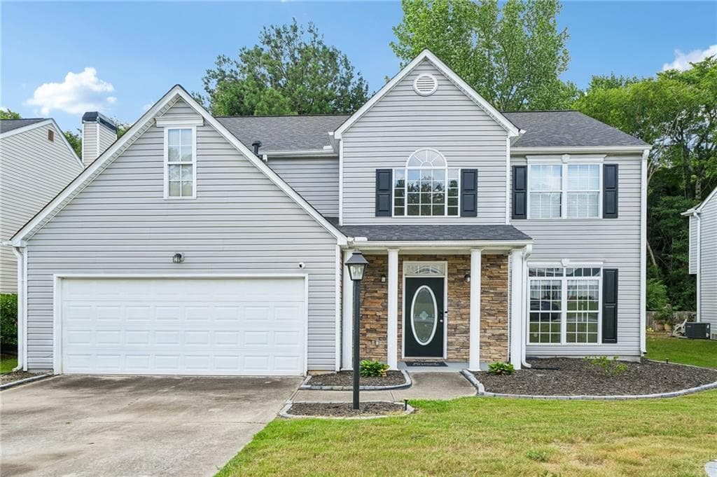 4 bedroom, 3 bathroom, 2,264 sq ft single family residence for sale at 2182 Fall Creek Lodge, Loganville, GA 30052 — photo 2