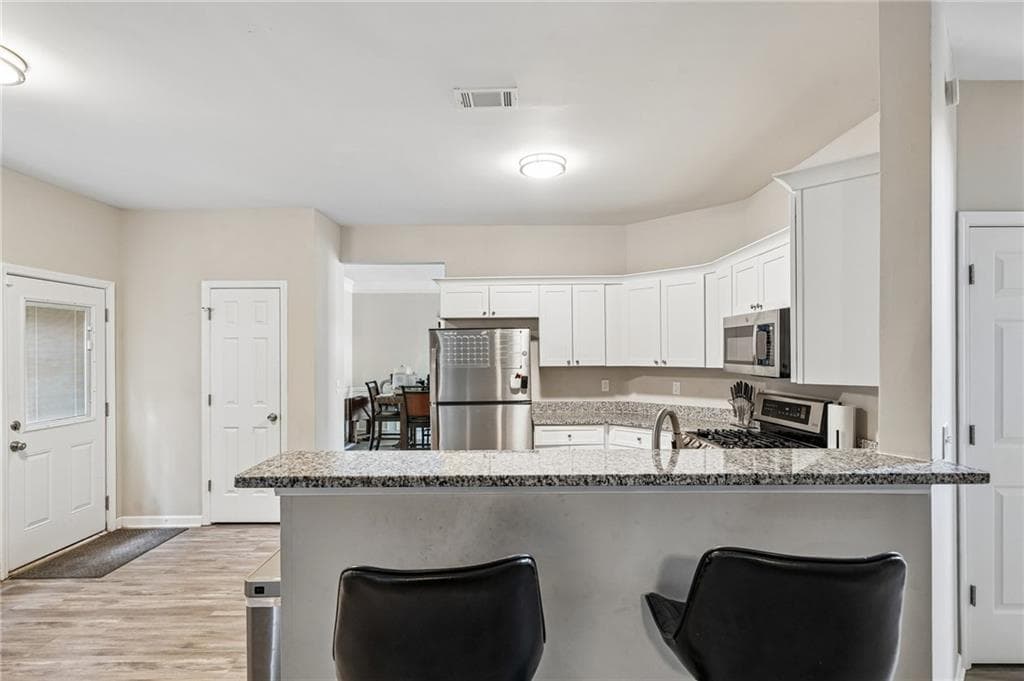 4 bedroom, 3 bathroom, 2,264 sq ft single family residence for sale at 2182 Fall Creek Lodge, Loganville, GA 30052 — photo 8