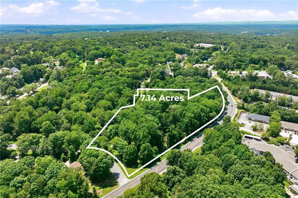 6 bedroom, 7 bathroom, 6,488 sq ft single family residence for sale at 1403 Springdale Road, Gainesville, GA 30501 — photo 4