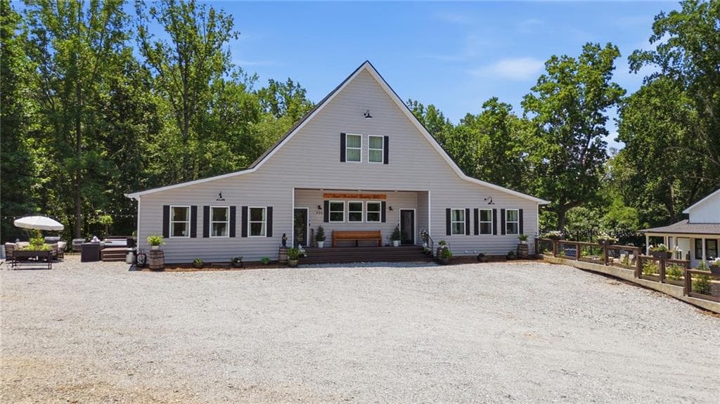 7 bedroom, 6 bathroom, 6,212 sq ft single family residence for sale at 426 Thompson Creek Park Road, Dawsonville, GA 30534 — photo 4