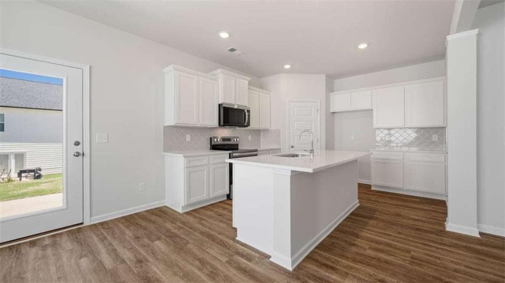 4 bedroom, 3 bathroom single family residence for sale at 11979 Aukerman Way, Hampton, GA 30228 — photo 9