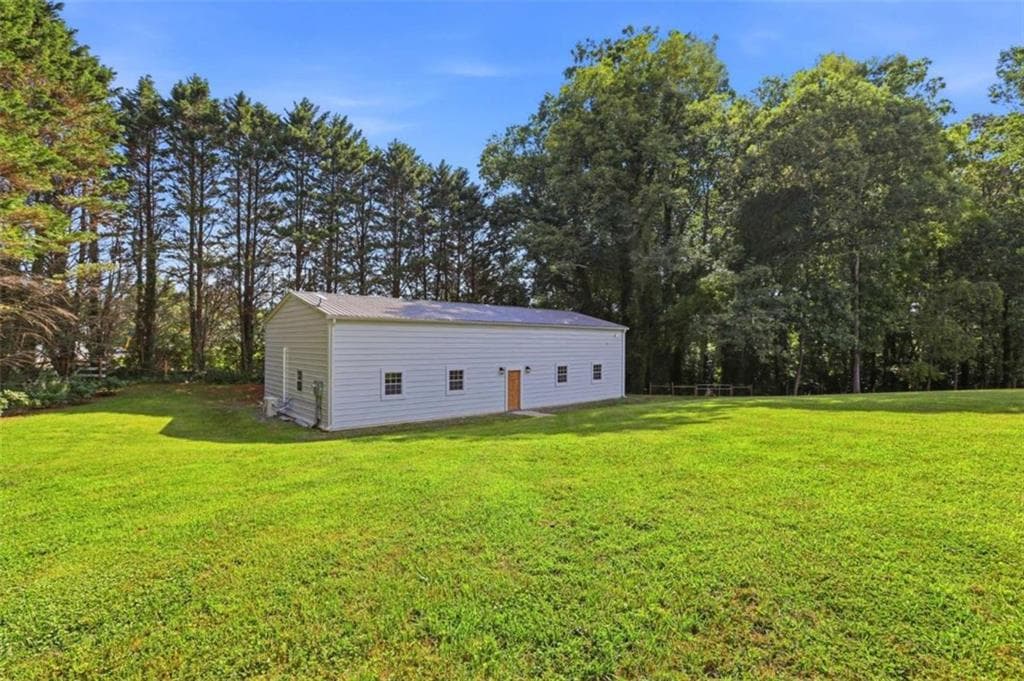 4 bedroom, 3 bathroom, 3,554 sq ft single family residence for sale at 527 N Mize Road, Mount Airy, GA 30563 — photo 4