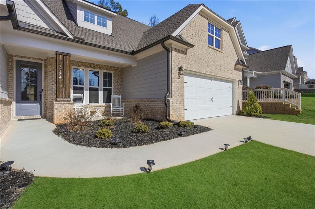 4 bedroom, 3 bathroom, 2,707 sq ft single family residence for sale at 6984 Manchester Drive, Flowery Branch, GA 30542 — photo 4