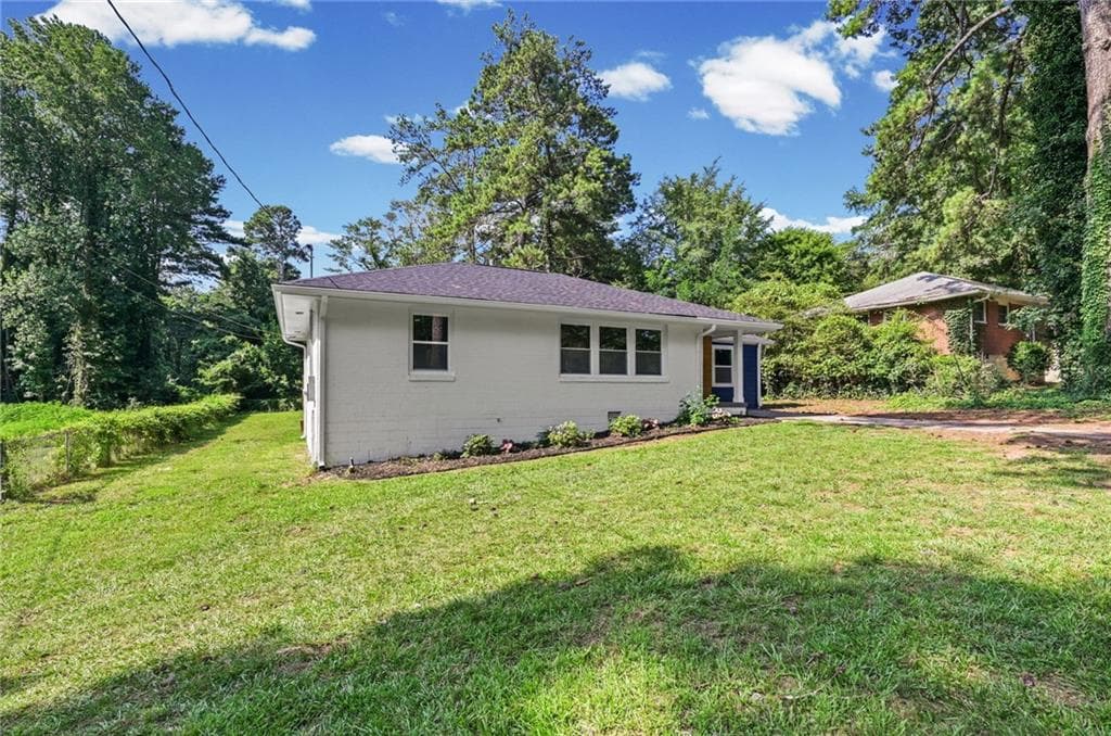 3 bedroom, 2 bathroom, 1,658 sq ft single family residence for sale at 3253 Mcafee Road, Decatur, GA 30032 — photo 2