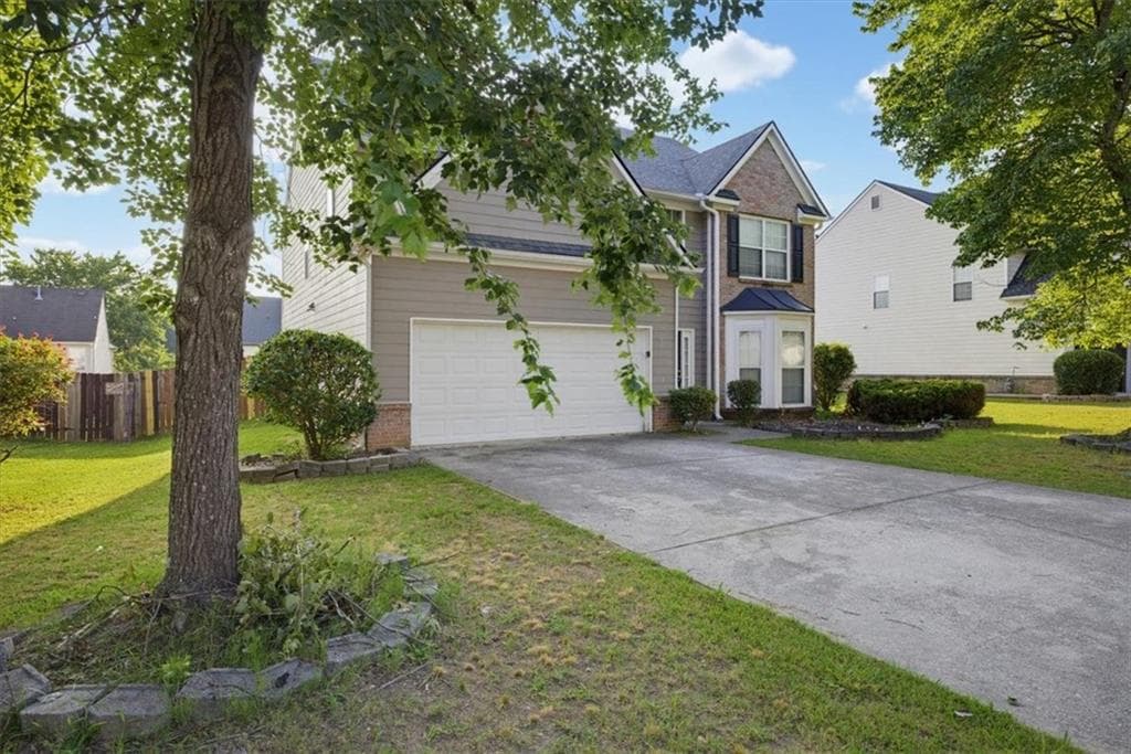 4 bedroom, 3 bathroom, 2,483 sq ft single family residence for sale at 3246 Shady Valley Lane, Loganville, GA 30052 — photo 2