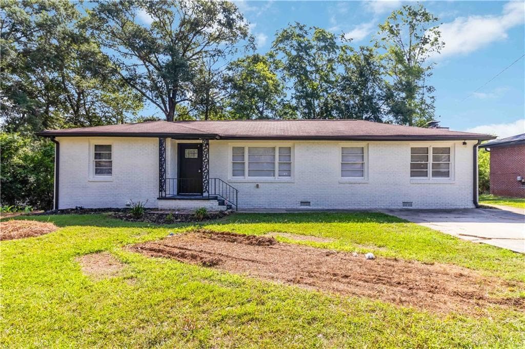 3 bedroom, 1 bathroom, 1,306 sq ft single family residence for sale at 8151 Puckett Street, Covington, GA 30014 — photo 1 of 24