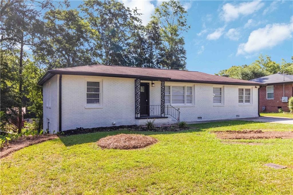 3 bedroom, 1 bathroom, 1,306 sq ft single family residence for sale at 8151 Puckett Street, Covington, GA 30014 — photo 2