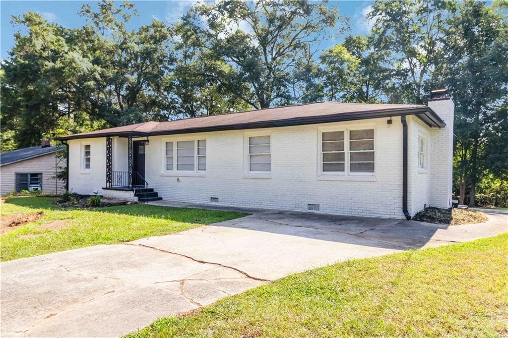 3 bedroom, 1 bathroom, 1,306 sq ft single family residence for sale at 8151 Puckett Street, Covington, GA 30014 — photo 4