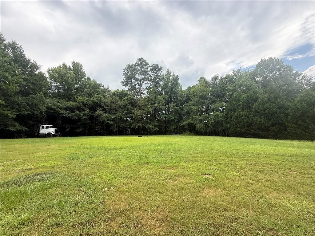 2 bedroom, 1 bathroom, 1,200 sq ft single family residence for sale at 1565 Dr Bramblett Road, Cumming, GA 30028 — photo 2
