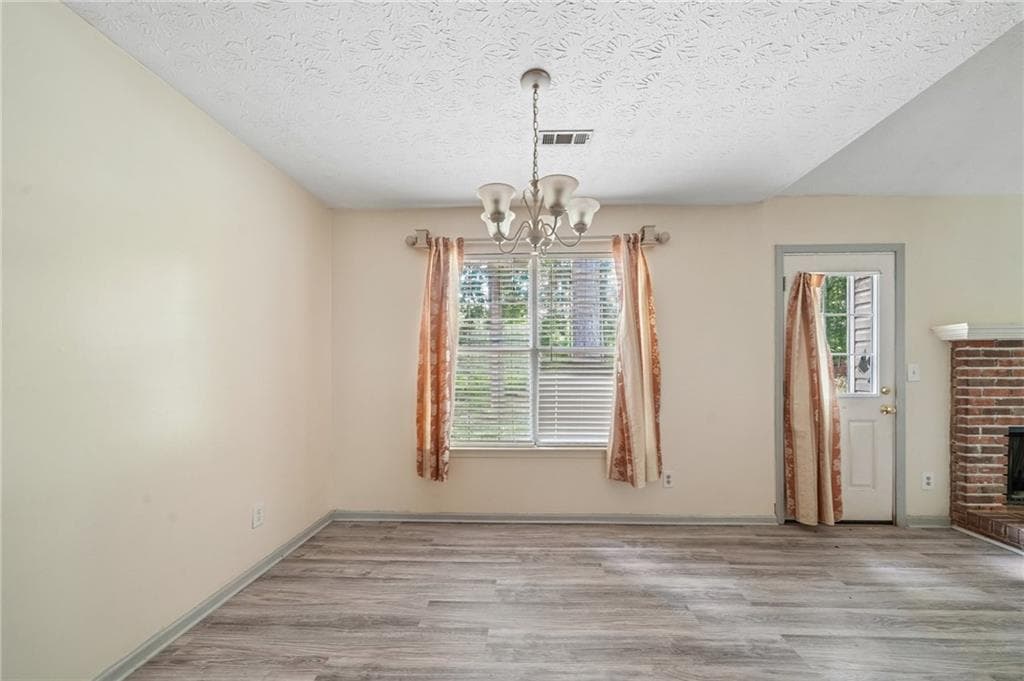 3 bedroom, 2 bathroom, 1,580 sq ft single family residence for sale at 7216 Ironwood Drive, Gainesville, GA 30507 — photo 3