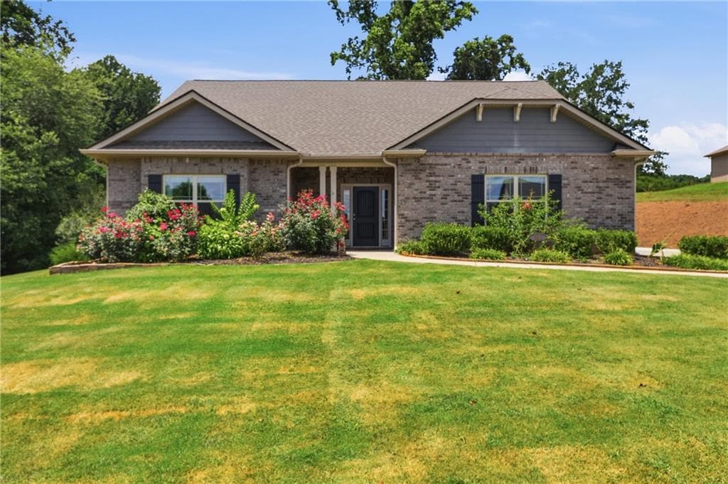 5 bedroom, 3 bathroom, 2,870 sq ft single family residence for sale at 5911 Wauka Valley Pass, Clermont, GA 30527 — photo 2