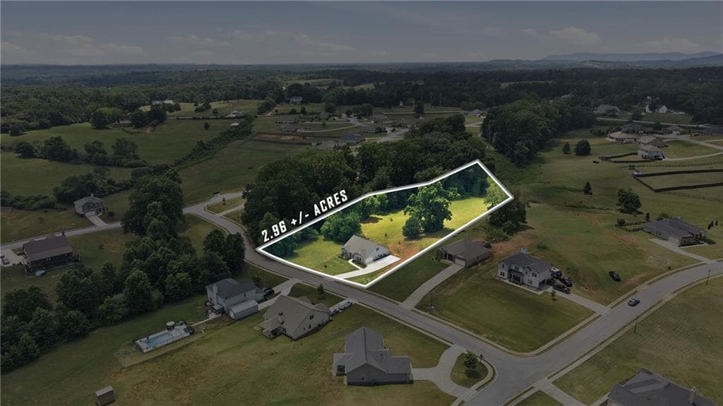 5 bedroom, 3 bathroom, 2,870 sq ft single family residence for sale at 5911 Wauka Valley Pass, Clermont, GA 30527 — photo 6