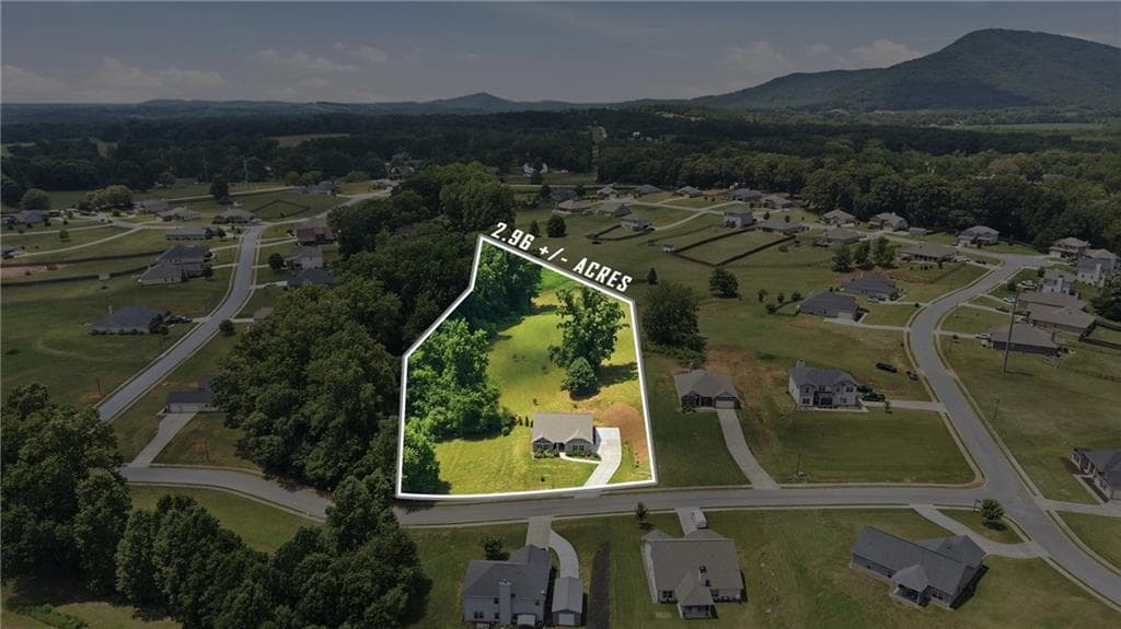5 bedroom, 3 bathroom, 2,870 sq ft single family residence for sale at 5911 Wauka Valley Pass, Clermont, GA 30527 — photo 7