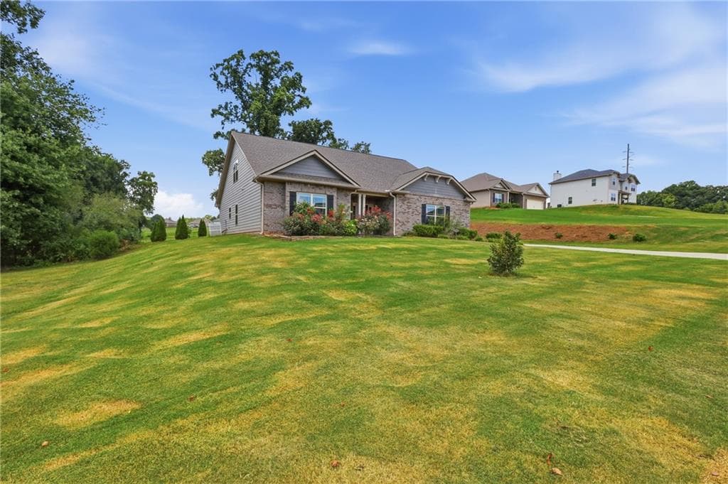 5 bedroom, 3 bathroom, 2,870 sq ft single family residence for sale at 5911 Wauka Valley Pass, Clermont, GA 30527