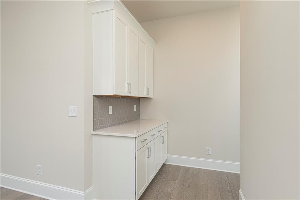5 bedroom, 6 bathroom, 3,585 sq ft single family residence for sale at 5525 Misty Glen Lane, Cumming, GA 30040 — photo 10