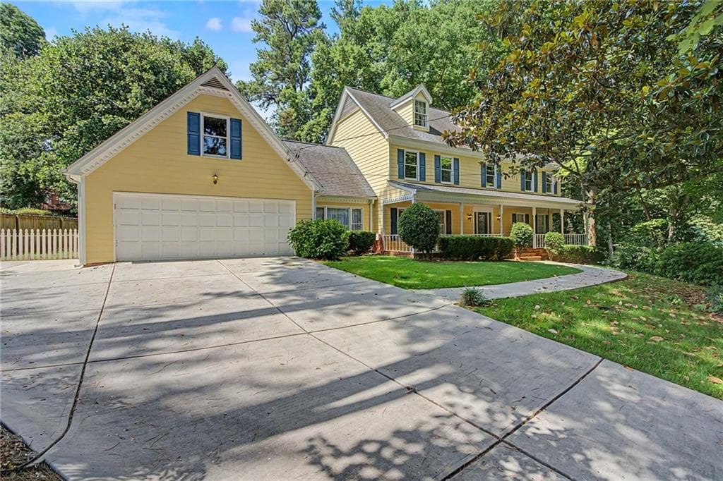 4 bedroom, 3 bathroom, 3,083 sq ft single family residence for sale at 4044 Jewelers Court, Lilburn, GA 30047 — photo 2