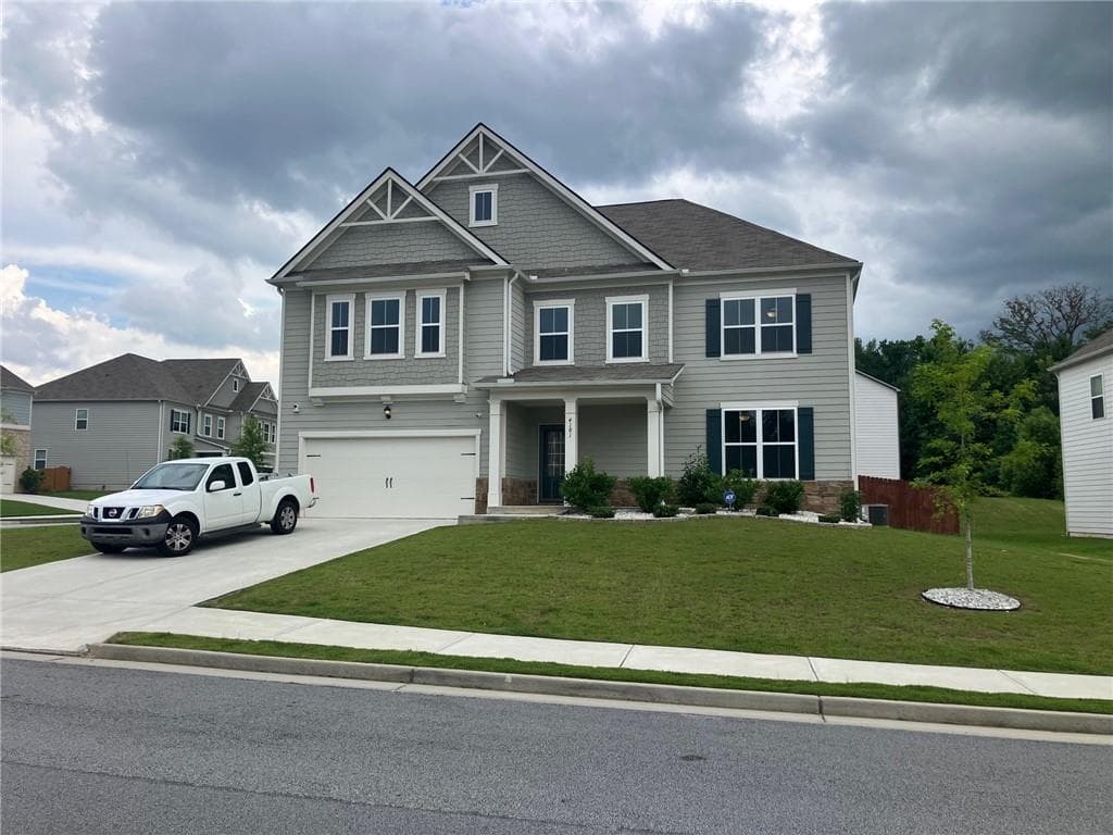 5 bedroom, 3 bathroom, 3,208 sq ft single family residence for sale at 4181 Oakhurst Drive, Fairburn, GA 30213 — photo 2