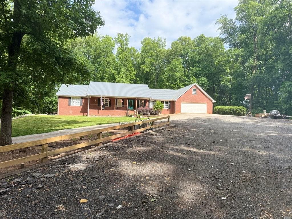 9 bedroom, 5 bathroom, 5,013 sq ft single family residence for sale at 4580 Hopewell Road, Cumming, GA 30028