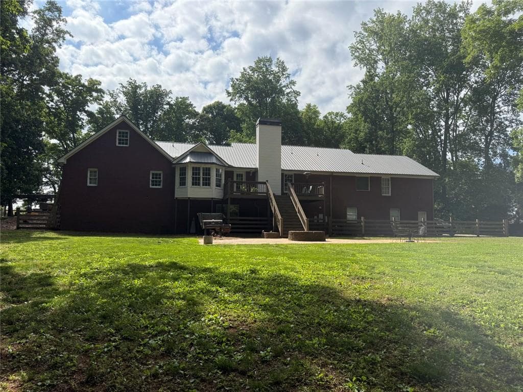 9 bedroom, 5 bathroom, 5,013 sq ft single family residence for sale at 4580 Hopewell Road, Cumming, GA 30028 — photo 3