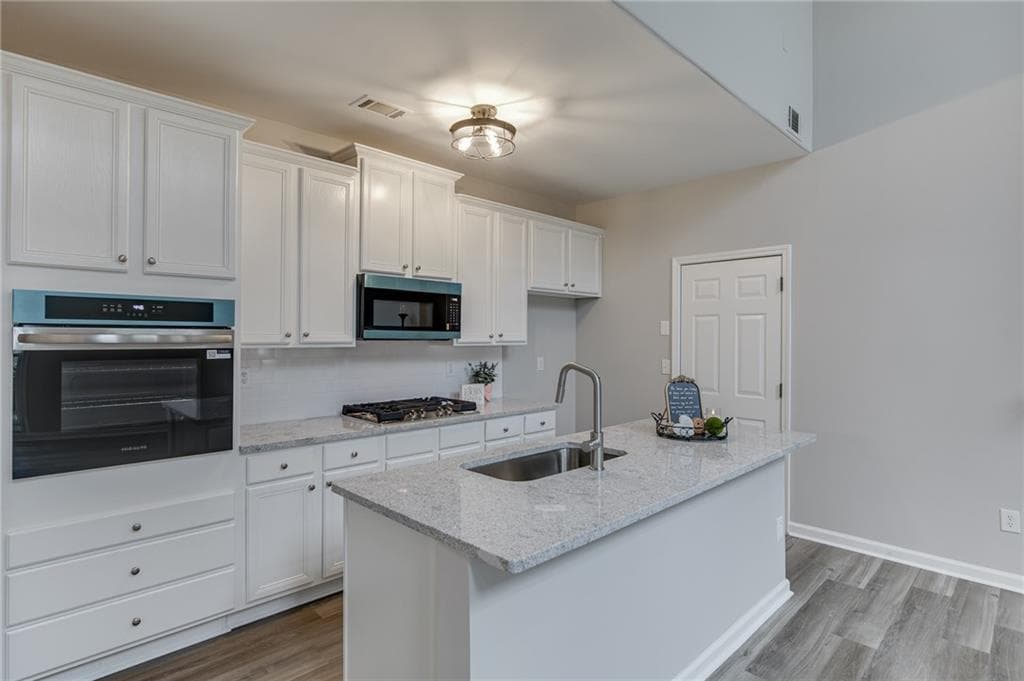 3 bedroom, 3 bathroom, 2,256 sq ft single family residence for sale at 3941 Lake Pass Lane, Suwanee, GA 30024 — photo 10