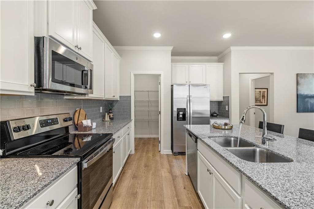 4 bedroom, 3 bathroom, 2,506 sq ft single family residence for sale at 211 Whispering Pines Avenue, Conyers, GA 30094 — photo 6