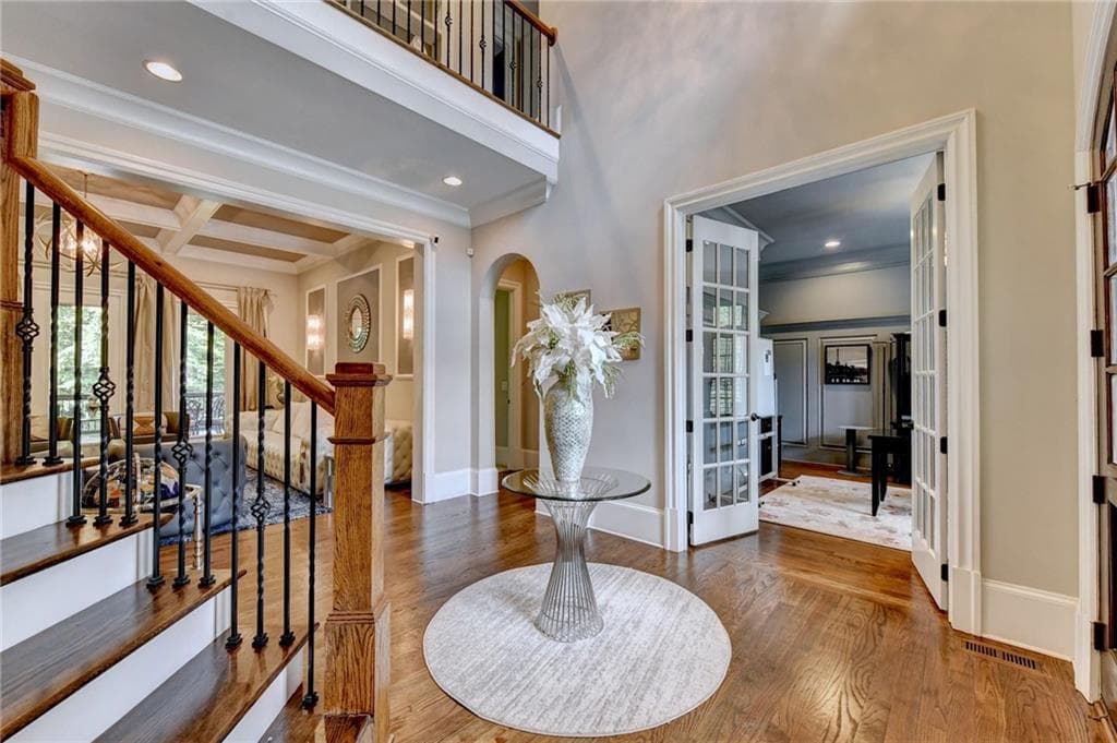6 bedroom, 7 bathroom, 7,610 sq ft single family residence for sale at 215 Penrith Place, Atlanta, GA 30350 — photo 2