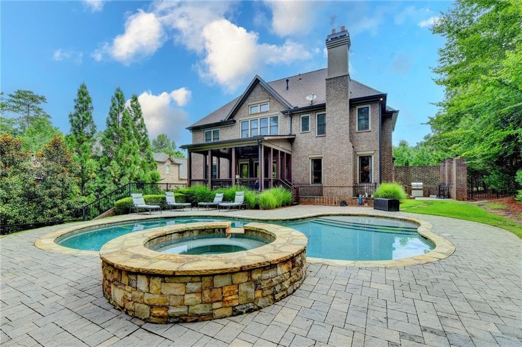 6 bedroom, 7 bathroom, 7,610 sq ft single family residence for sale at 215 Penrith Place, Atlanta, GA 30350