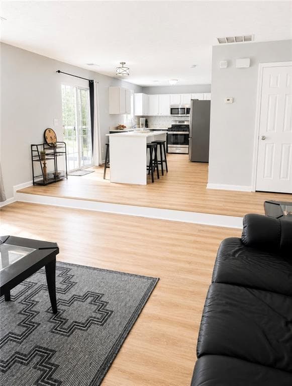 6 bedroom, 3 bathroom, 2,836 sq ft single family residence for sale at 6009 Riveroak Terrace, College Park, GA 30349 — photo 3