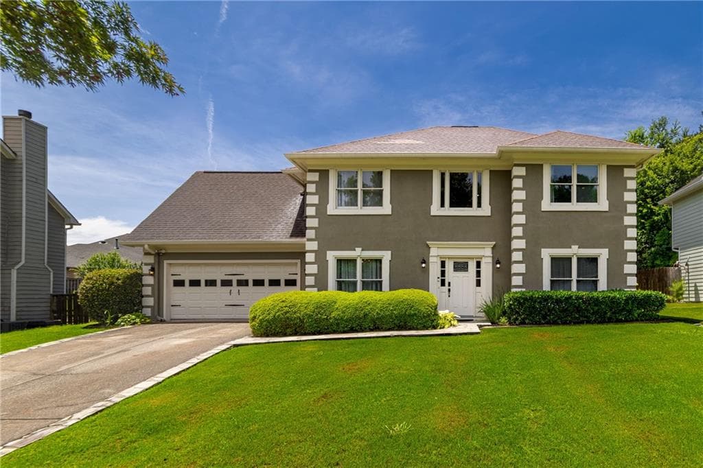 4 bedroom, 3 bathroom, 2,260 sq ft single family residence for sale at 11840 Aspen Forest Drive, Johns Creek, GA 30005 — photo 2
