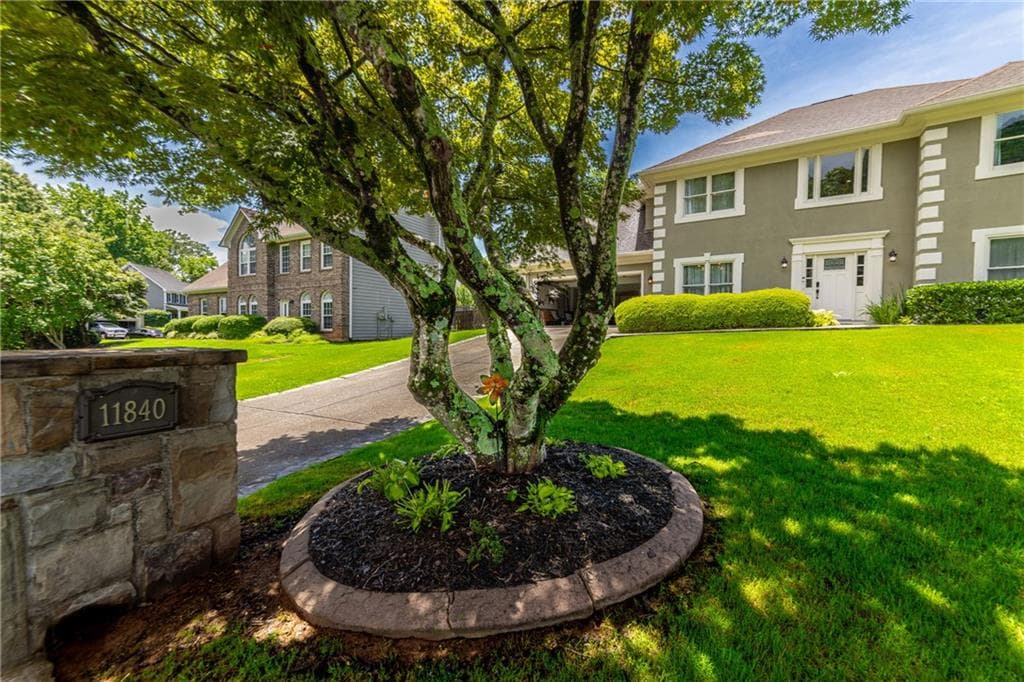 4 bedroom, 3 bathroom, 2,260 sq ft single family residence for sale at 11840 Aspen Forest Drive, Johns Creek, GA 30005 — photo 3