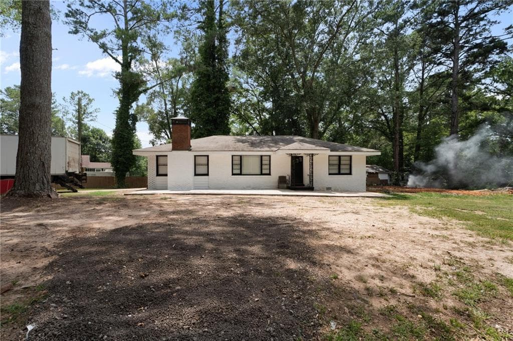 3 bedroom, 2 bathroom, 1,364 sq ft single family residence for sale at 1132 Bethsaida Road, Riverdale, GA 30296 — photo 3