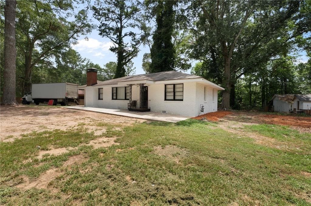3 bedroom, 2 bathroom, 1,364 sq ft single family residence for sale at 1132 Bethsaida Road, Riverdale, GA 30296 — photo 4