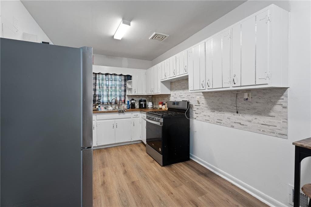 3 bedroom, 2 bathroom, 1,364 sq ft single family residence for sale at 1132 Bethsaida Road, Riverdale, GA 30296 — photo 9