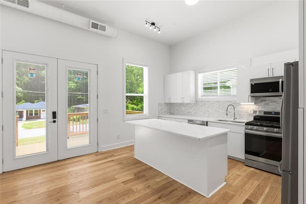 3 bedroom, 2 bathroom, 1,800 sq ft single family residence for sale at 2585 Hood Avenue, Atlanta, GA 30318 — photo 2