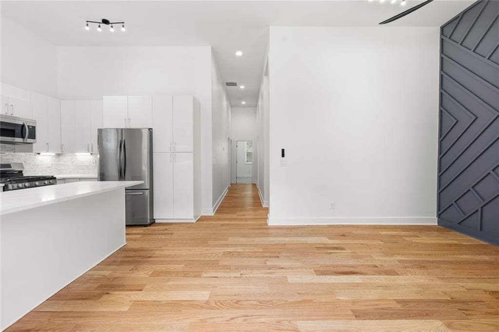 3 bedroom, 2 bathroom, 1,800 sq ft single family residence for sale at 2585 Hood Avenue, Atlanta, GA 30318 — photo 3