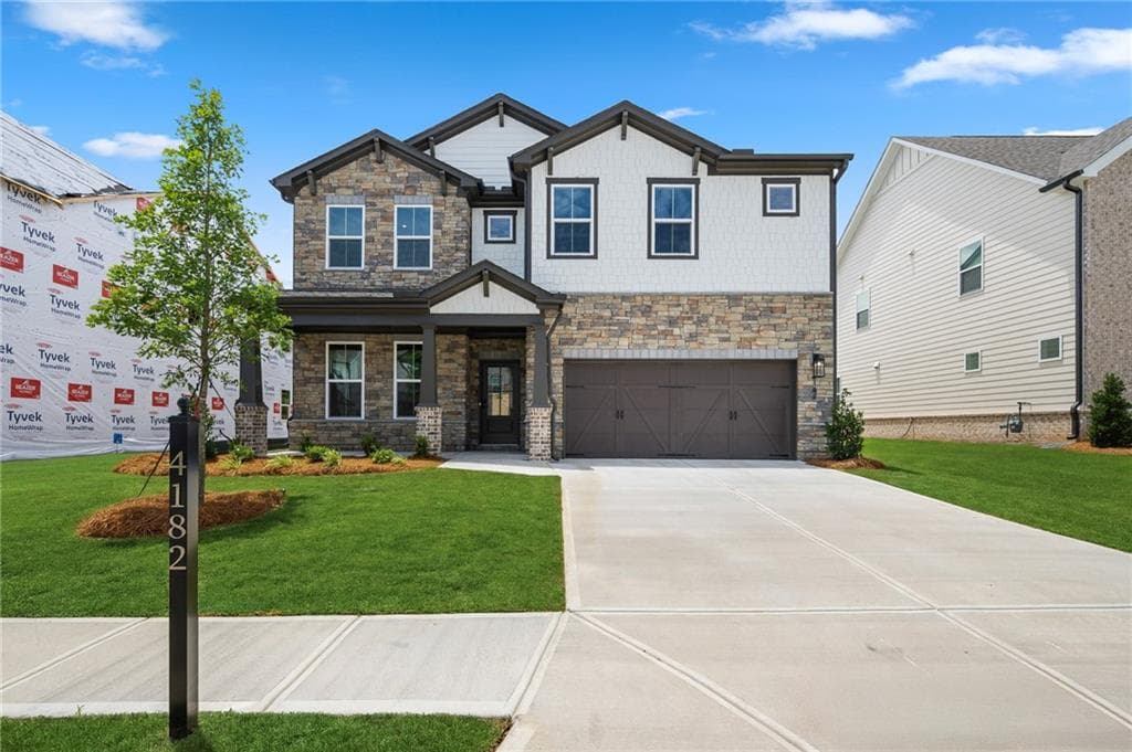5 bedroom, 4 bathroom, 3,133 sq ft single family residence for sale at 4182 Adler Circle, Buford, GA 30519