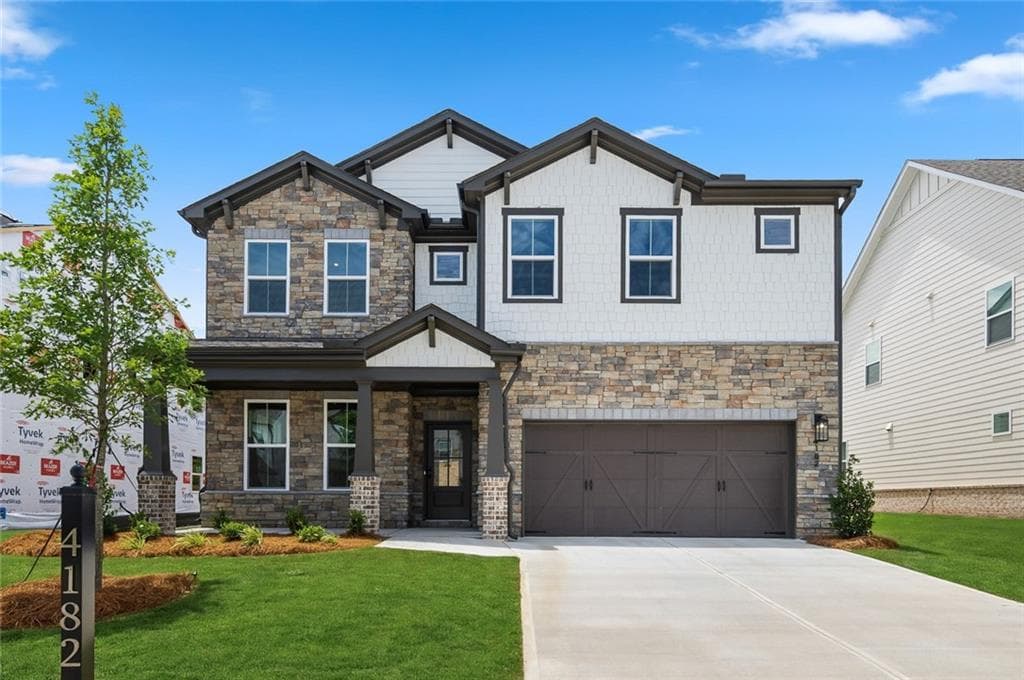 5 bedroom, 4 bathroom, 3,133 sq ft single family residence for sale at 4182 Adler Circle, Buford, GA 30519 — photo 3