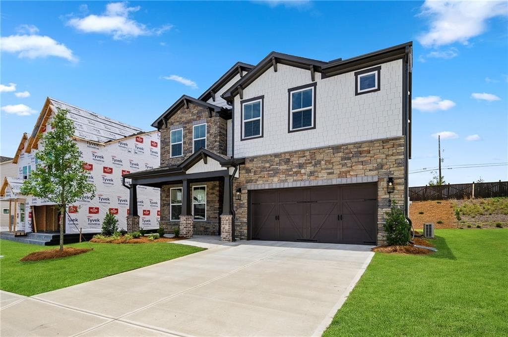 5 bedroom, 4 bathroom, 3,133 sq ft single family residence for sale at 4182 Adler Circle, Buford, GA 30519 — photo 4