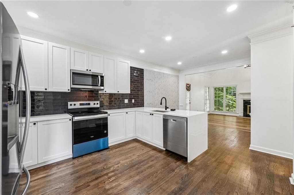 5 bedroom, 4 bathroom, 3,282 sq ft single family residence for sale at 2164 Cape Liberty Drive, Suwanee, GA 30024 — photo 4