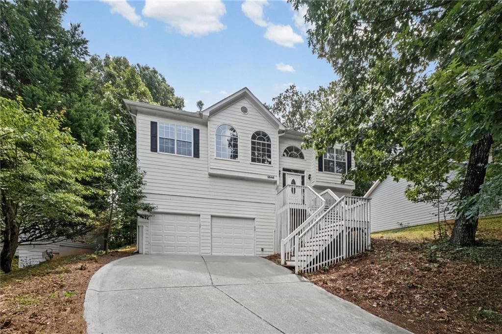 4 bedroom, 3 bathroom, 2,420 sq ft single family residence for sale at 2646 Mcguire Drive, Kennesaw, GA 30144 — photo 3