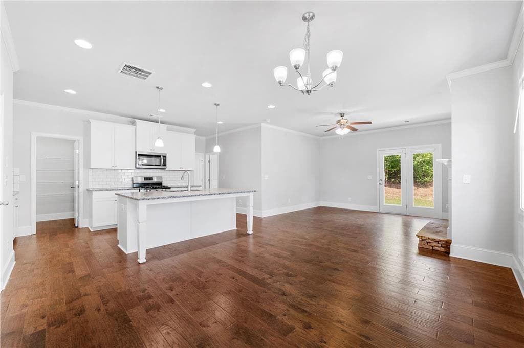 5 bedroom, 3 bathroom, 2,368 sq ft single family residence for sale at 4335 Huron Drive, Cumming, GA 30028 — photo 3
