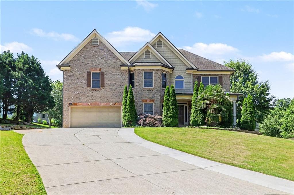 5 bedroom, 5 bathroom, 5,841 sq ft single family residence sold at 2607 Creek Rock Circle, Buford, GA 30519