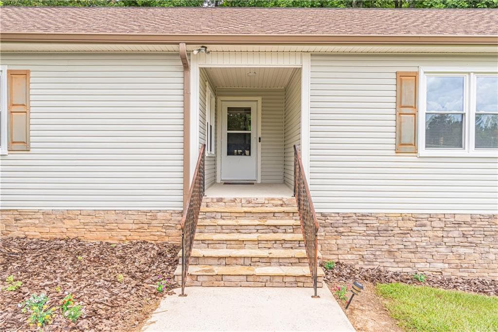5 bedroom, 5 bathroom, 3,411 sq ft single family residence for sale at 1860 Jett Ridge Road, Cumming, GA 30041 — photo 5
