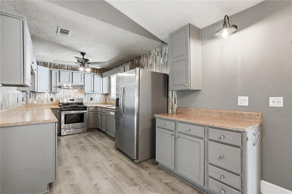 3 bedroom, 2 bathroom, 1,260 sq ft single family residence for sale at 107 Riverchase Drive, Woodstock, GA 30188 — photo 5