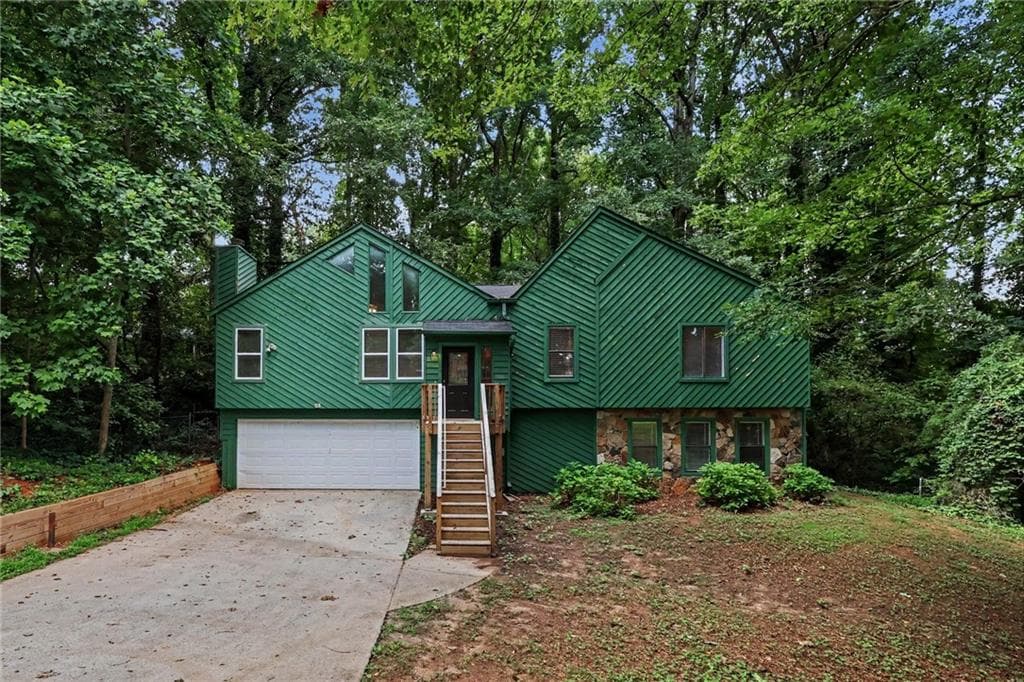 4 bedroom, 3 bathroom, 2,311 sq ft single family residence for sale at 5182 Manitou Way, Stone Mountain, GA 30087