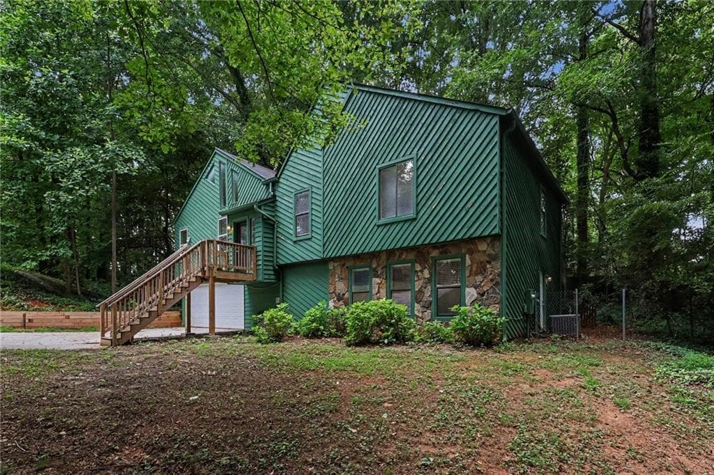 4 bedroom, 3 bathroom, 2,311 sq ft single family residence for sale at 5182 Manitou Way, Stone Mountain, GA 30087 — photo 3