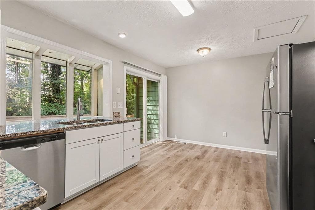 4 bedroom, 3 bathroom, 2,311 sq ft single family residence for sale at 5182 Manitou Way, Stone Mountain, GA 30087 — photo 9