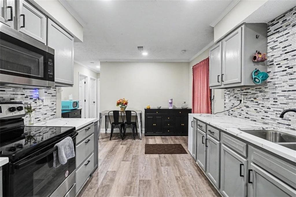4 bedroom, 2 bathroom, 1,526 sq ft single family residence for sale at 166 Kipling Way, Riverdale, GA 30274 — photo 9
