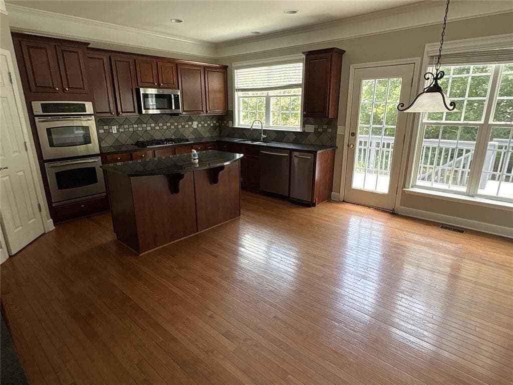 5 bedroom, 4 bathroom, 4,377 sq ft single family residence for sale at 315 Harmony Lake Drive, Canton, GA 30115 — photo 9